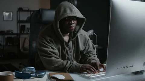 Black Man Hacking Cybersecurity System on Desktop Computer Stock Footage 348144142