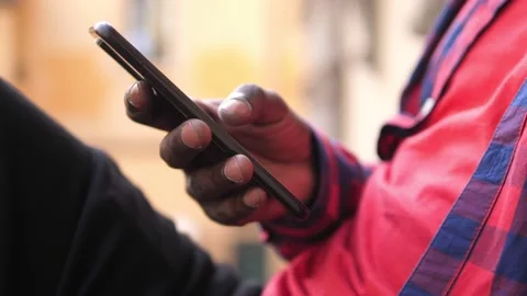 Black man hand typing on mobile phone: communication, technology concept Video stock 219623975