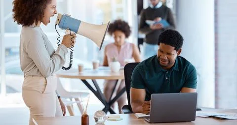 Black man, laptop and boss on megaphone angry or shouting at employee Stock Photos