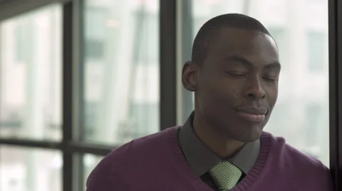 A Black Man Looks Into the Camera (1 of 2) Stock Footage 47630420