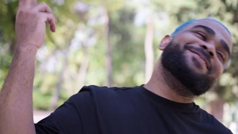 Black man making gesture of shooting at his head Stock Footage 287487543
