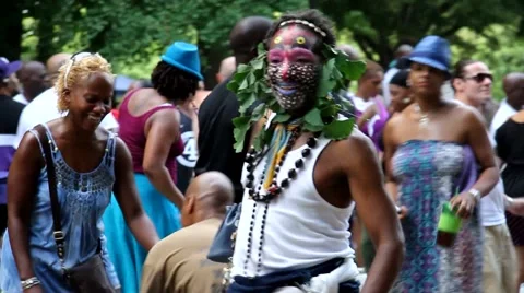 Black man with painted face dancing Stock Footage 54336849