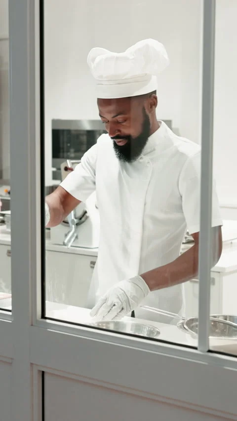 Black man, pastry chef and baking with dough in kitchen for bread, dessert or 库存影片 332972955