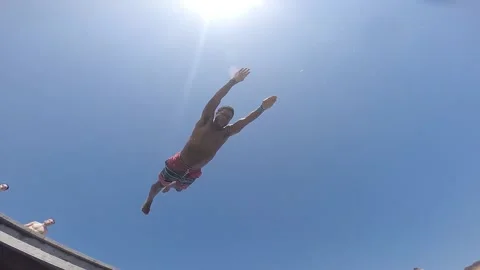Black Man Performs Dive, Slow Motion, Underwater Camera Stock Footage 146552349