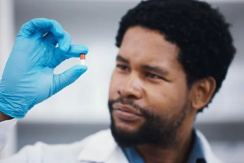 Black man, pharmacist or holding medicine in research, medical healthcare or Stock Photos