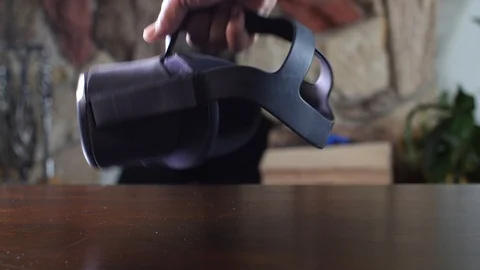 Black man picking a VR headset Video stock 126929617