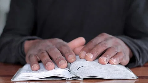 black man praying to god with bible in h... | Stock Video | Pond5