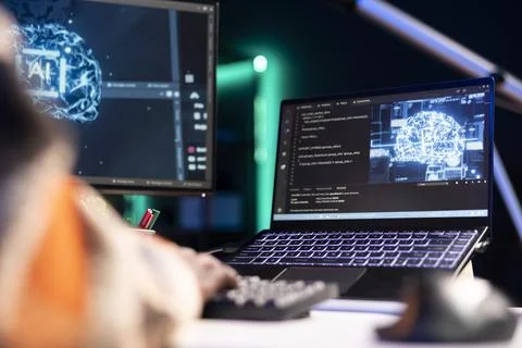 Black man programmer manages code and scripts in artificial intelligence 写真素材