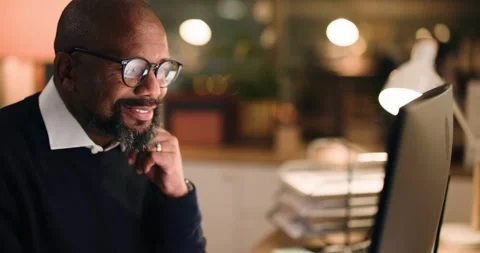 Black man, reading and night with computer in office for accounting, finance Stock Footage 316667865
