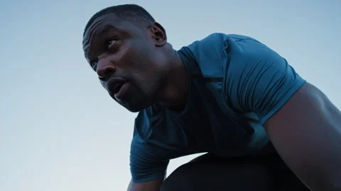 Black man, runner and outdoor for start with sprint for form, coordination and Stock Footage 331230276