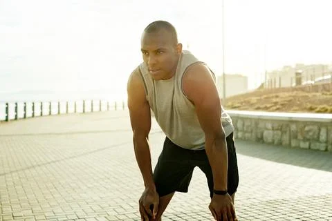 Black man, runner and thinking on beach promenade, city or break with reflection Stock Photos