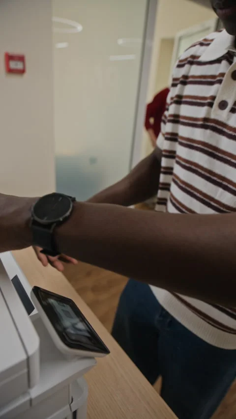 Black Man Scanning Paper Document on Office Photocopier Stock Footage 343715502