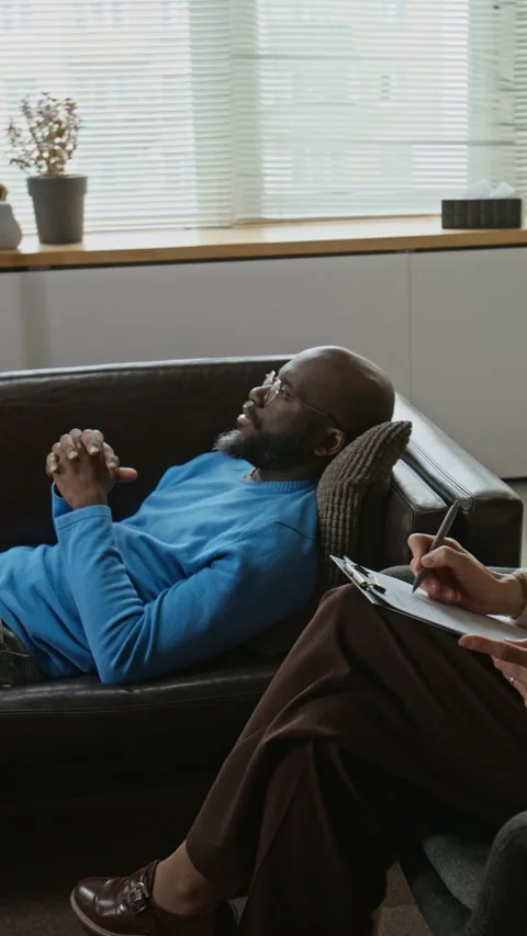 Black Man Sharing Problems with Therapist during Psychotherapy Session Stock Footage 337636520