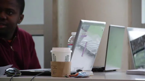 Black Man Sitting in front of the Computer table Stock Footage 36141851