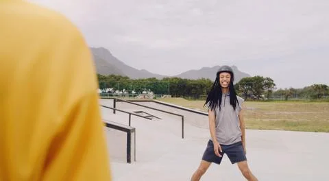 Black man at skate park, sports outdoor with gen z youth, happy and freedom Stock Photos