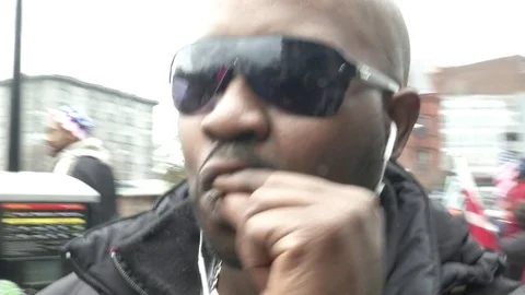Black Man Smokes Joint Pro-Marijuana Inaugural Protest Stock Footage 71809139
