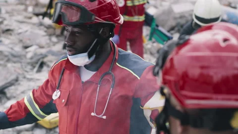 Black man speaking during rescue mission Stock Footage 166148477