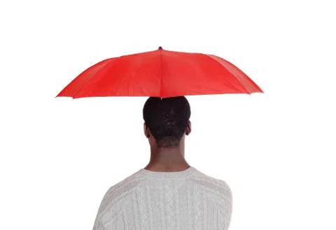 Black man standing from back with red umbrella Stock Photos