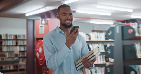 Black man, student and phone with loudspeaker at library for research project, Stock Footage 319762230