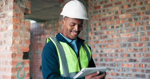 Black man, tablet and smile on construction site for inspection, task brief or Vídeos de archivo 337016865