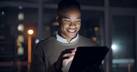 Black man, tablet and walking at night in office for business trading, planning Stock Footage 247264377