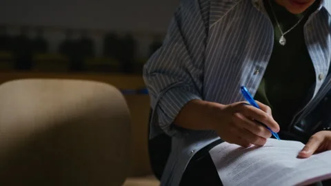 Black Man Taking Notes on Script in Student Theater Rehearsal Stock Footage 344518231
