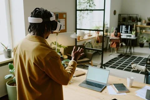 Black Man Testing VR App In Modern Office Stock Photos