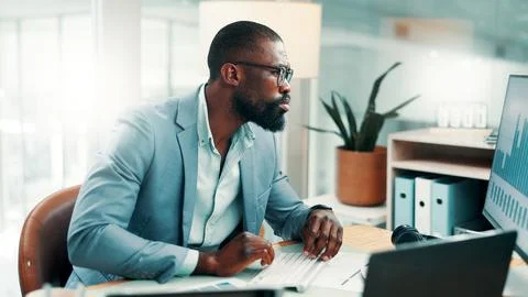 Black man, typing and computer with graphs at office for review, insight and Stock Photos