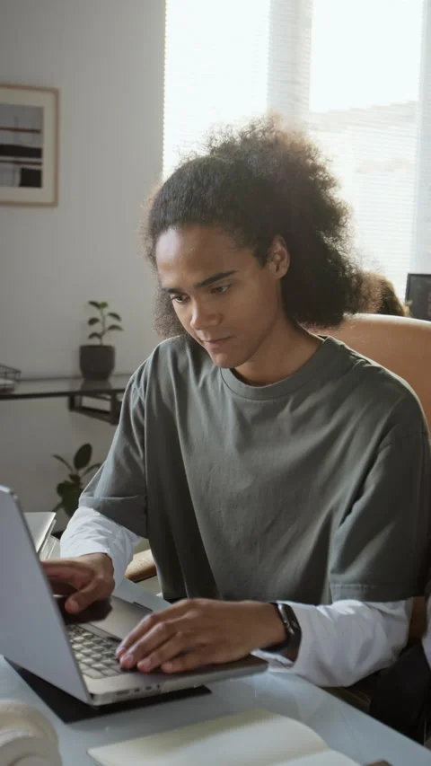 Black Man Typing on Laptop Computer for Remote Project Work Stock Footage 348156330