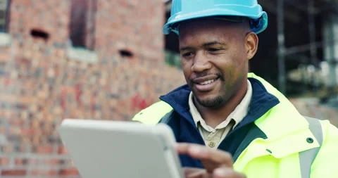 Black man, typing or tablet on construction site for planning, building project Stock Footage 336794189
