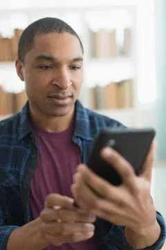 Black man using digital tablet 库存照片