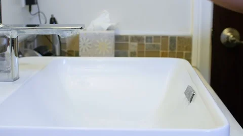 Black man wetting hands Stock Footage 126743710