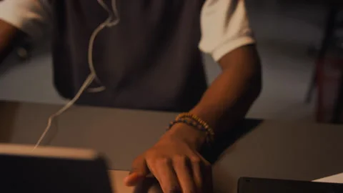 Black Man Working Late in Office Feeling Stressed during Overtime Stock Footage 338416267
