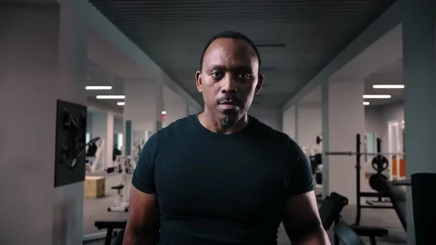 Black man workout with dumbbell training arms in gym.Bodybuilder training Stock Footage 225716775