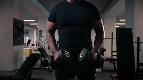 Black man workout with dumbbell training shoulders in gym.Bodybuilder training Stock Footage 225717377