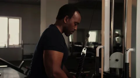 Black man workout in gym doing an exerci... | Stock Video | Pond5