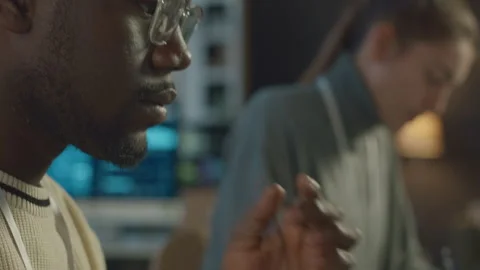 Black Man Writing Program Code on Laptop in Office Stock Footage 259151645