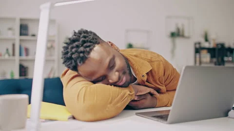 Black man yawning and falling asleep at workplace, procrastination, distant work Video stock 175340604