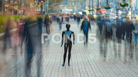 The black mannequin standing in a people crowd outdoor Stock Photos