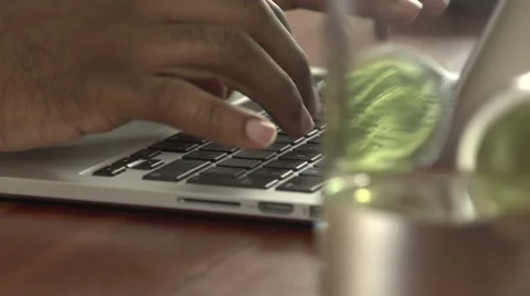 A black man's hands, typing - close-up Stock Footage