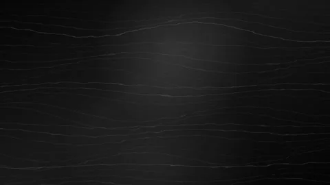 Black marble background with subtle white veins and light sweep Stock Footage 335937188
