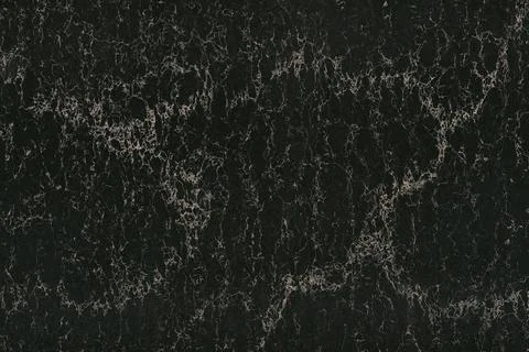 Black marble texture background pattern top view. Stone granite wall with bright Stock Photos