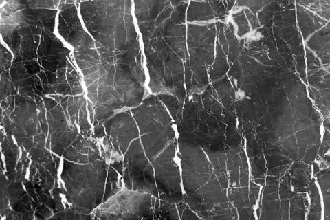 Black marble texture with delicate veins Stock Photos