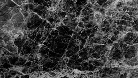 Black marble texture with lots of contrasting veining Stock Photos