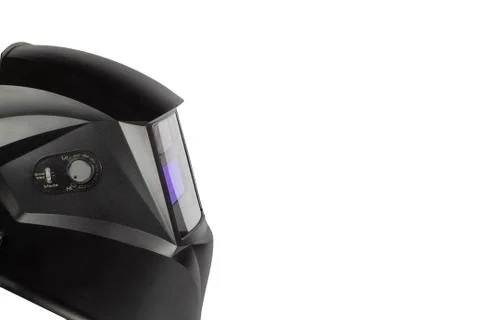 Black mask to perform welding work on a white background, view from the side. Stock Photos