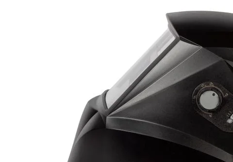 Black mask to perform welding work on a white background, view from the side. Stock Photos