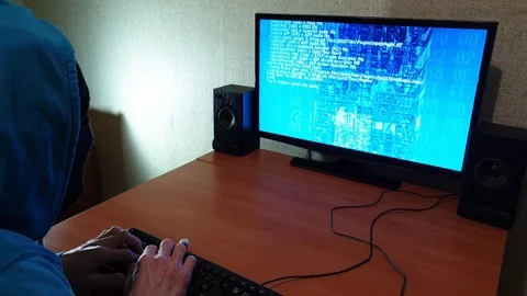 The Black masked man using computer Stock-Footage 106022758