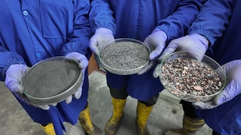 Black mass is a dark, metallic powder left over after lithium-ion batteries are Stock Footage 346335929