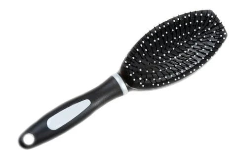 Black massage plastic comb Stock Photos