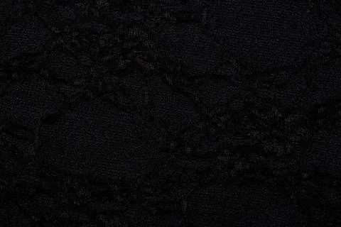 Black material with abstract pattern, a background or texture Stock Photos